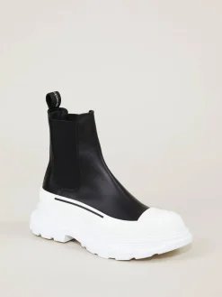 Boots mit breiter Gummisohle Schwarz/Weiß
