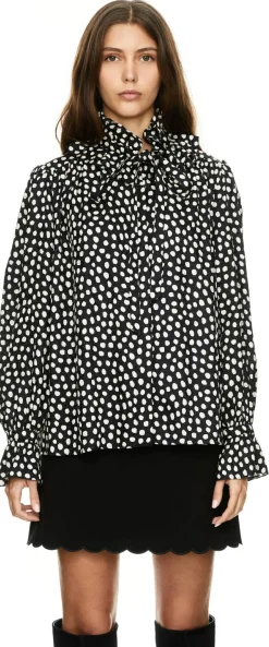 Gepunktete Rüschenbluse aus Seide Schwarz/Beige