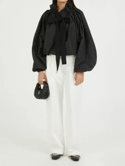 Voluminöse Bluse mit Schleife Schwarz